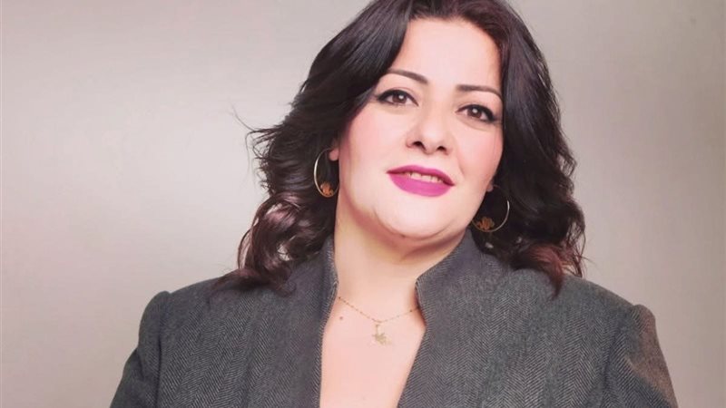 الكاتبة الصحفية إيمان
