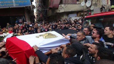 بالصور.. جنازة عسكرية لأمين الشرطة شهيد تفجير 