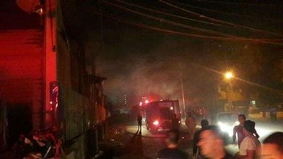 الحماية المدنية تواصل إطفاء حريق سوق توشكى بحلوان