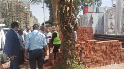 حي العجوزة يُصادر مواد بناء خاصة بإنشاء سور مخالف لنادي الزمالك النهري (صور)