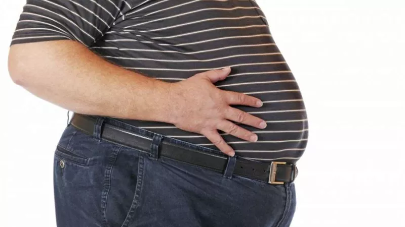 تعرف على أسباب زيادة وزن الرجل بعد الزواج
