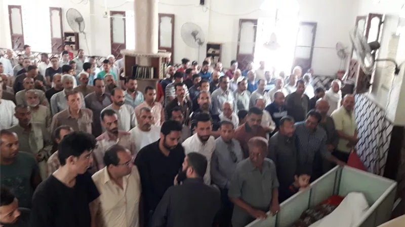 بالصور.. أهالي الفيوم يشيعون جثمان محمد أبو الوفا