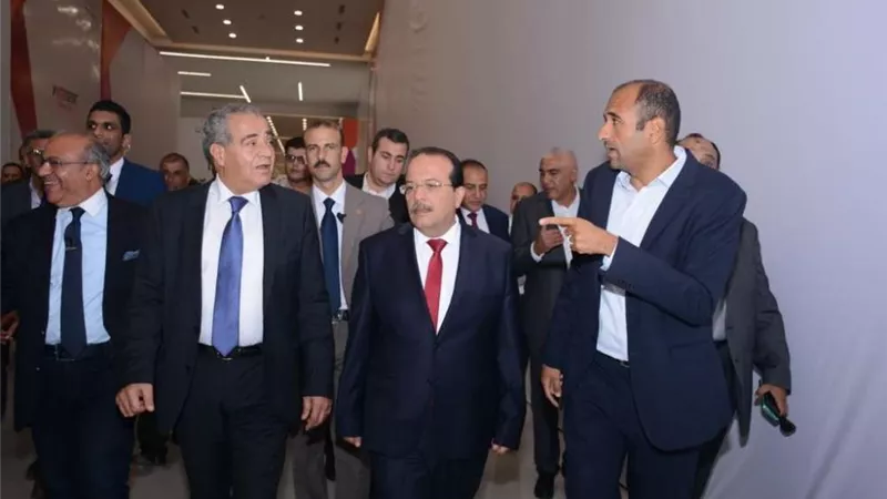 وزير التموين خلال افتتاح 