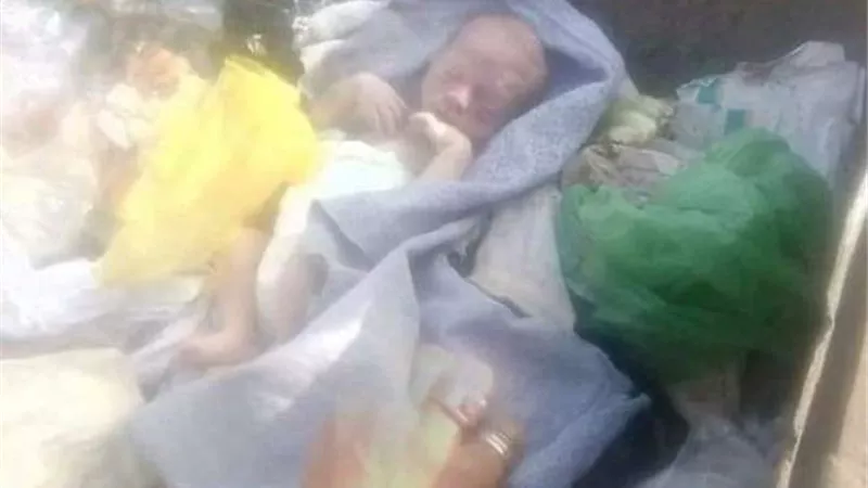 لغز العثور على طفل حديث الولادة في مقلب قمامة بأسيوط