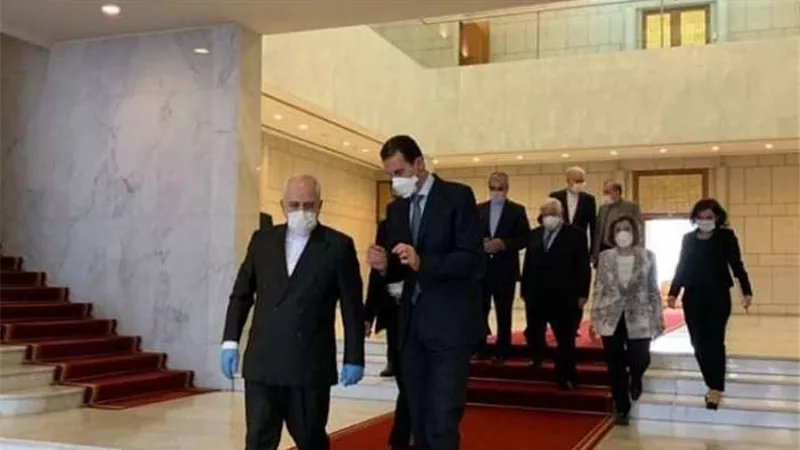 وسط احتياطات كورونا.. لقاء استثنائي بين الأسد وظريف في دمشق
