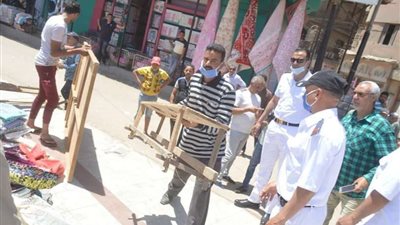 حملة لإزالة التعديات على الطريق العام بالمحلة
