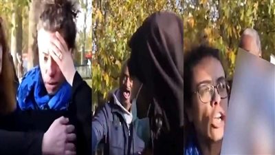 شاهد .. لحظة صفع امرأة حاملة صورة مسيئة للنبي محمد بلندن