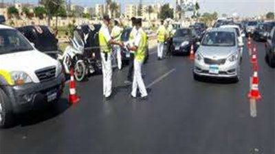 شرطة المرور تكثف جهودها لرصد المخالفات بمحاور القاهرة والجيزة