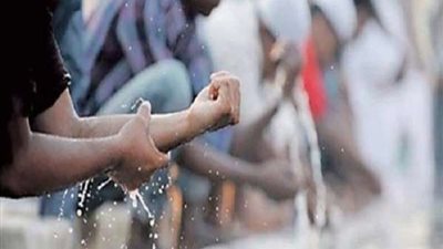 حكم  غسل الرجلين في الوضوء دون دلكهما.. الإفتاء تجيب