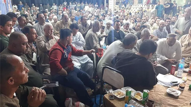 أمن الجيزة ينهي خصومة بين 3 عائلات بالصف.. صور