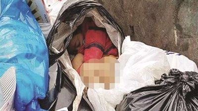 الأب قتل طفله بسبب «كثرة التبول».. والأم ألقت جثته في القمامة بعين شمس