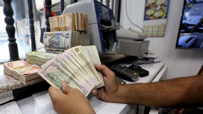 أسعار صرف الدولار مقابل الدينار العراقي منتصف تعاملات اليوم الأربعاء 