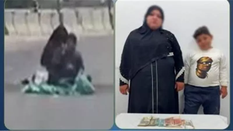  سيدة وطفلها يفترشان